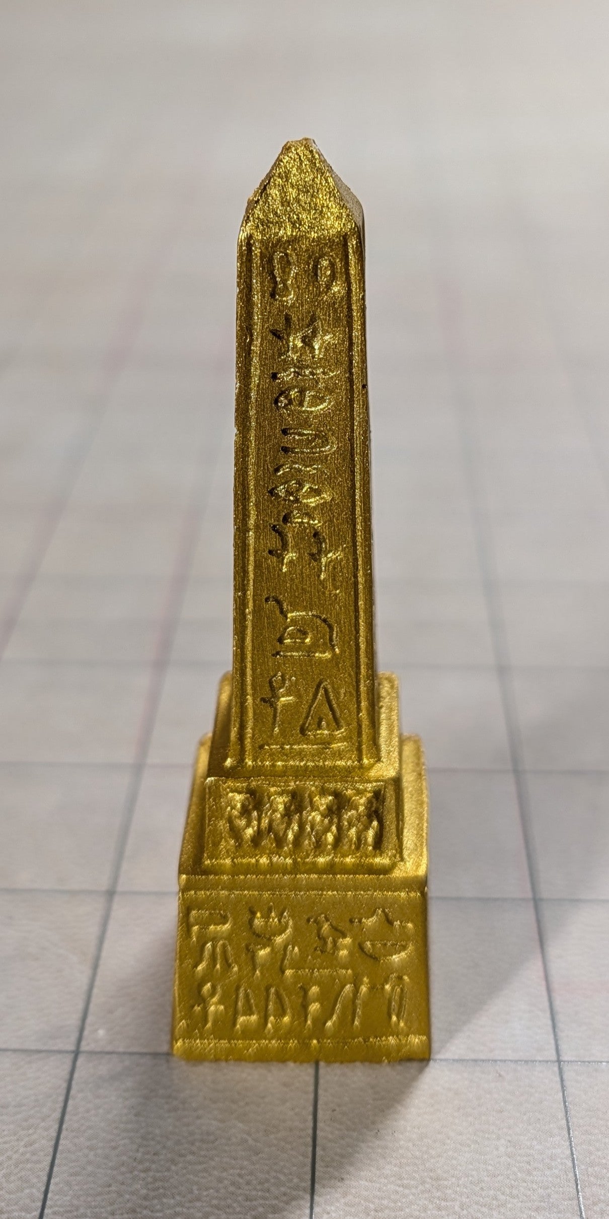 Gold Obelisk Covered in Nonsense (Table Flair)